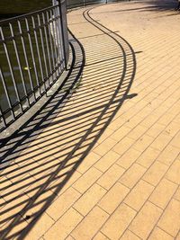 Shadow on cobblestone street