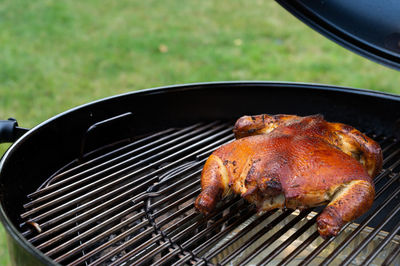 Close-up of meat on barbecue grill