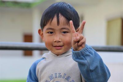 Portrait of cute boy posing for the camera