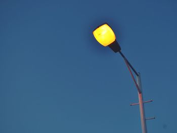 Low-angle view of street light