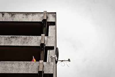 Close-up of german flag hanging on railing