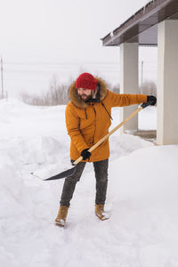 Full length of man skiing on snow