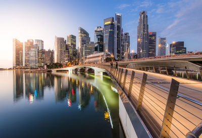 Illuminated city at waterfront