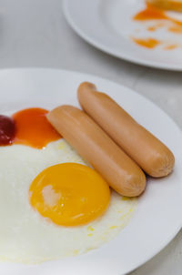 High angle view of breakfast served in plate on table