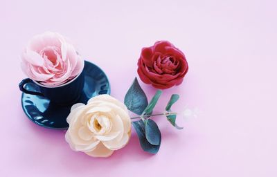 High angle view of rose bouquet against white background