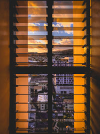 Buildings seen through glass window