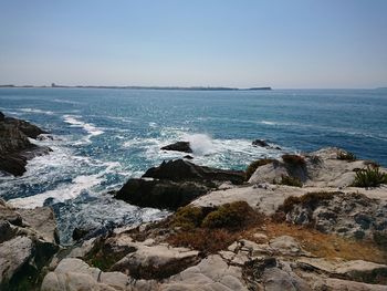 Scenic view of sea against clear sky