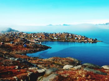 Scenic view of sea against blue sky