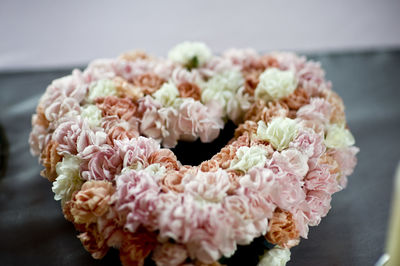 Close-up of pink flowers blooming indoors