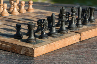 Close-up of chess board on table