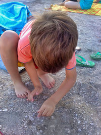 High angle view of girl playing on beach