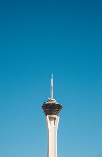 Low angle view of stratosphere against clear blue sky during sunny day