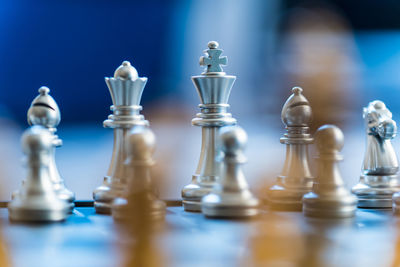 Close-up of chess pieces on board