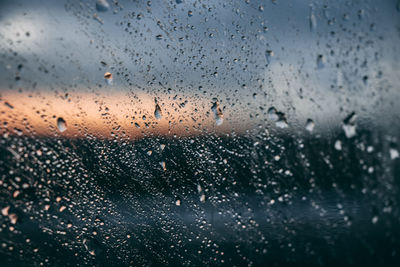 Full frame shot of wet glass window