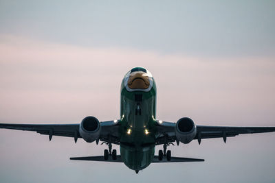 Low angle view of  airplane against sky