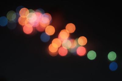 Defocused image of illuminated christmas lights