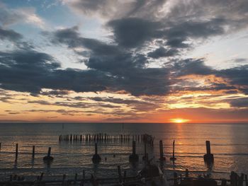 Scenic view of sea against dramatic sky