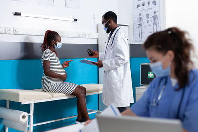 Doctor examining x-ray at clinic