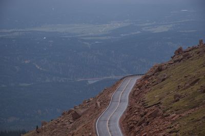 High angle view of road amidst mountains against sky