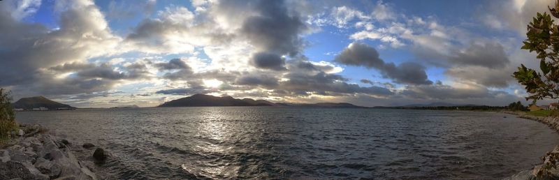 Panoramic view of sea against sky during sunset