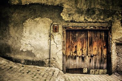 Closed wooden door of house