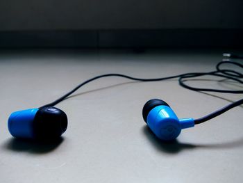 Close-up of headphones on table