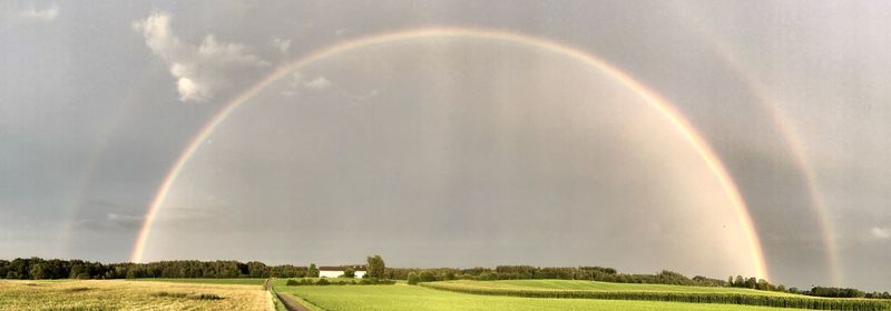 Scenic view of rainbow against sky