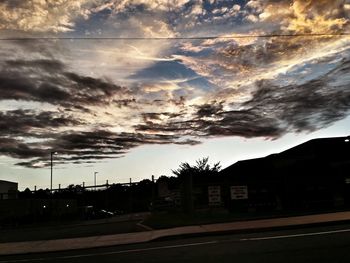 View of road against cloudy sky