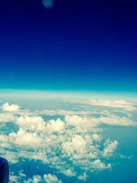 Aerial view of clouds over blue sky