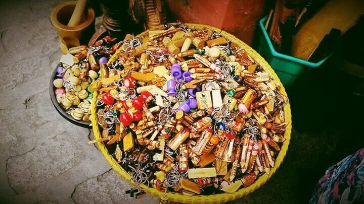 high angle view, indoors, variation, still life, multi colored, abundance, large group of objects, choice, table, no people, food and drink, food, day, messy, close-up, container, bowl, elevated view, mode of transport, transportation