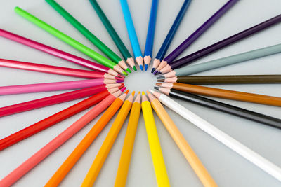High angle view of multi colored pencils on table