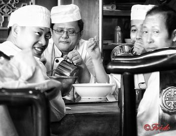 Close-up of friends at restaurant