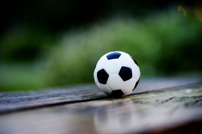 Close-up of soccer ball on table