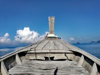 Close-up of built structure against blue sky