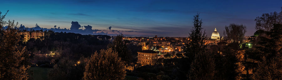 High angle view of buildings against sky during sunset