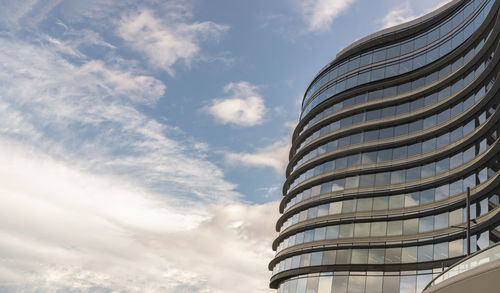 Low angle view of skyscraper against sky