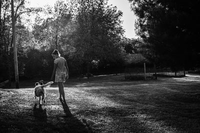 Woman with dog in park