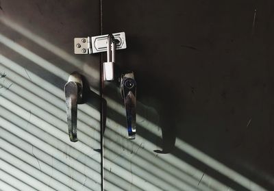 Doorhandle with light and shadow.