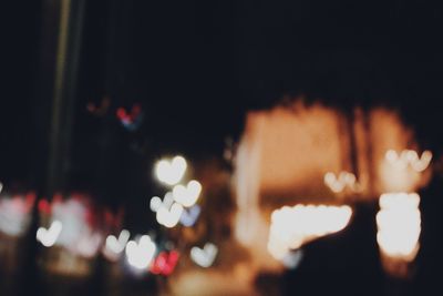 Defocused image of illuminated lights on window