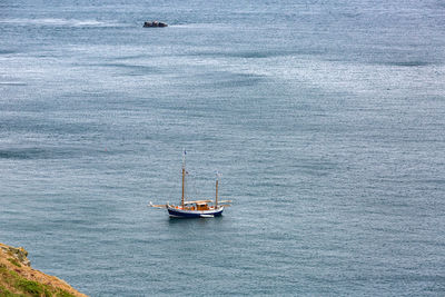 High angle view of ship sailing on sea against sky