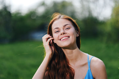 Portrait of young woman looking away