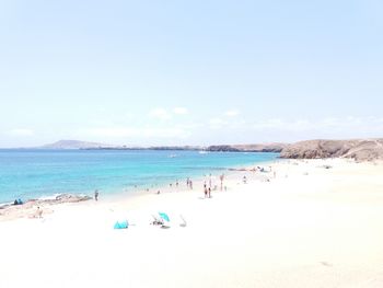 Panoramic view of beach against clear sky