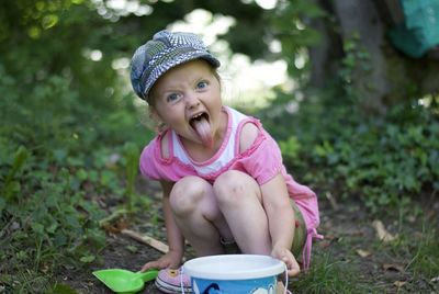 Portrait of cute girl wearing hat