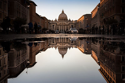 Reflection of buildings in lake