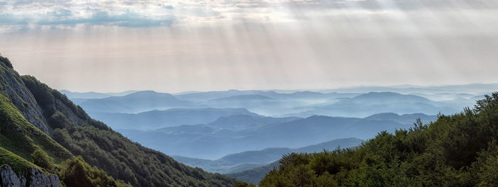 Panoramic view of mountains against sky