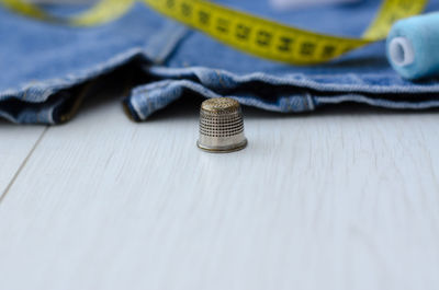 Close-up of coins on table