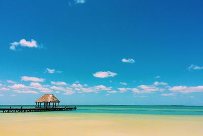Lifeguard hut on beach against blue sky holbox mexico