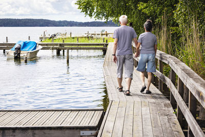 Senior couple resting at lakeside