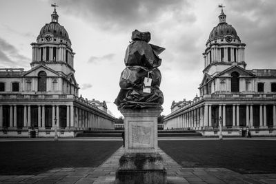 Statue of historic building against sky