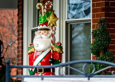 Santa claus statue outside house